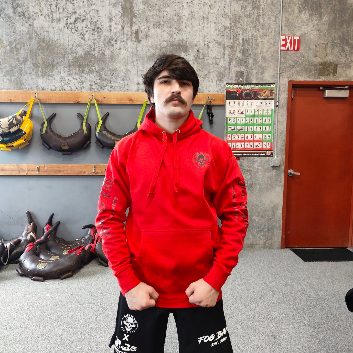 Hard To Kill Jiu Jitsu Logo Hoodie (on location)