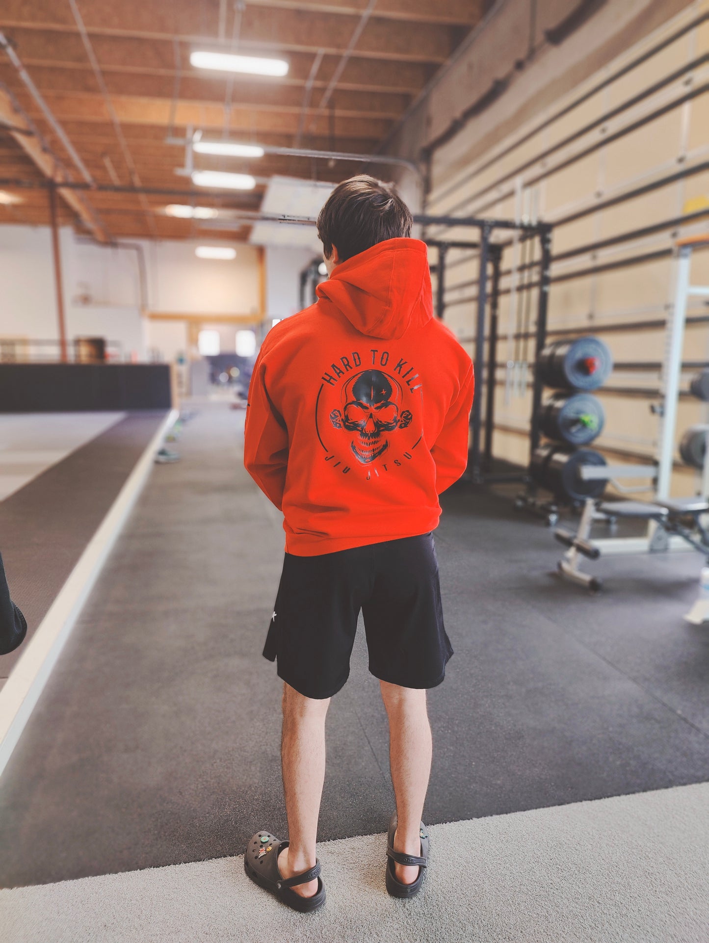 Hard To Kill Jiu Jitsu Logo Hoodie (on location)