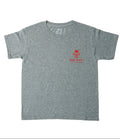 A heather gray short-sleeve t-shirt with a small red graphic on the left chest featuring a skull and the text 'HARD TO KILL' and 'THE DOG OF GOD'.